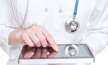 doctor-holding-tablet